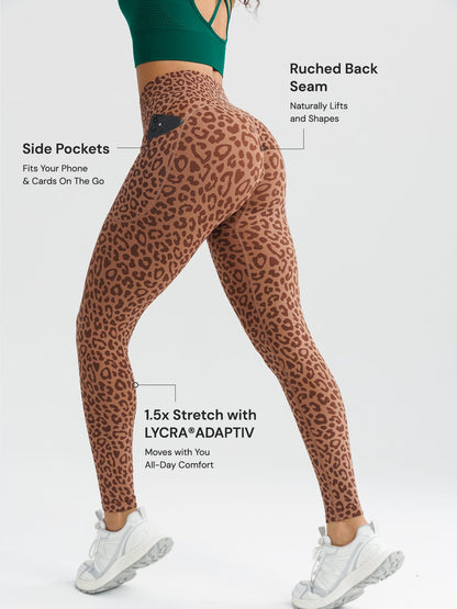 A model wearing a BRXL® B R X L™ Seamless High Waisted Butt-Lifting Leggings with Pockets