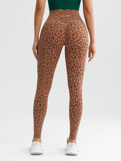 A model wearing a BRXL® B R X L™ Seamless High Waisted Butt-Lifting Leggings with Pockets
