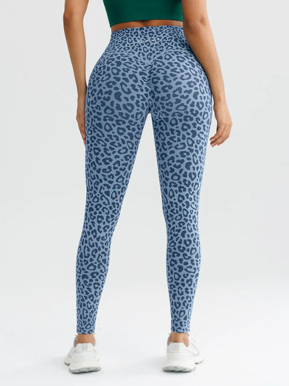 A model wearing a BRXL® B R X L™ Seamless High Waisted Butt-Lifting Leggings with Pockets