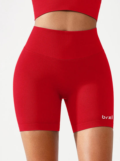 A model wearing a BRXL® B R X L™ Seamless Scrunch Butt Workout Shorts
