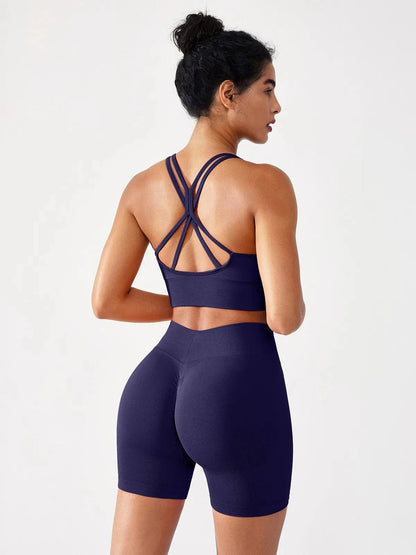 A model wearing a BRXL® BrxlGrit™ Seamless Scrunch Butt Workout Shorts in