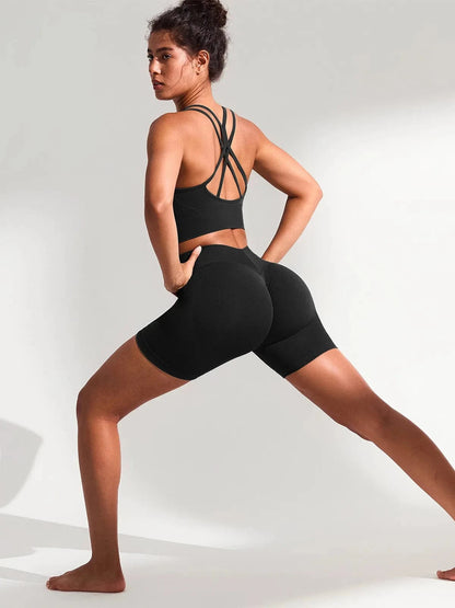 A model wearing a BRXL® BrxlGrit™ Seamless Scrunch Butt Workout Shorts in