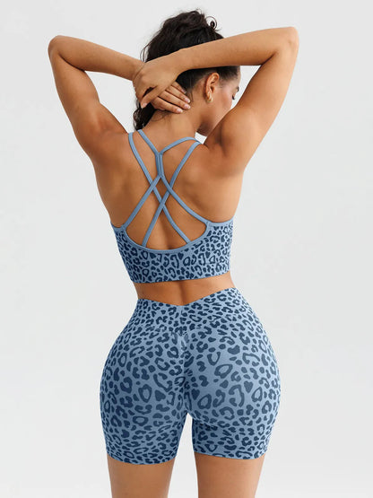 A model wearing a BRXL® B R X L™ Seamless Scrunch Butt Workout Shorts