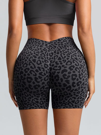 A model wearing a BRXL® B R X L™ Seamless Scrunch Butt Workout Shorts