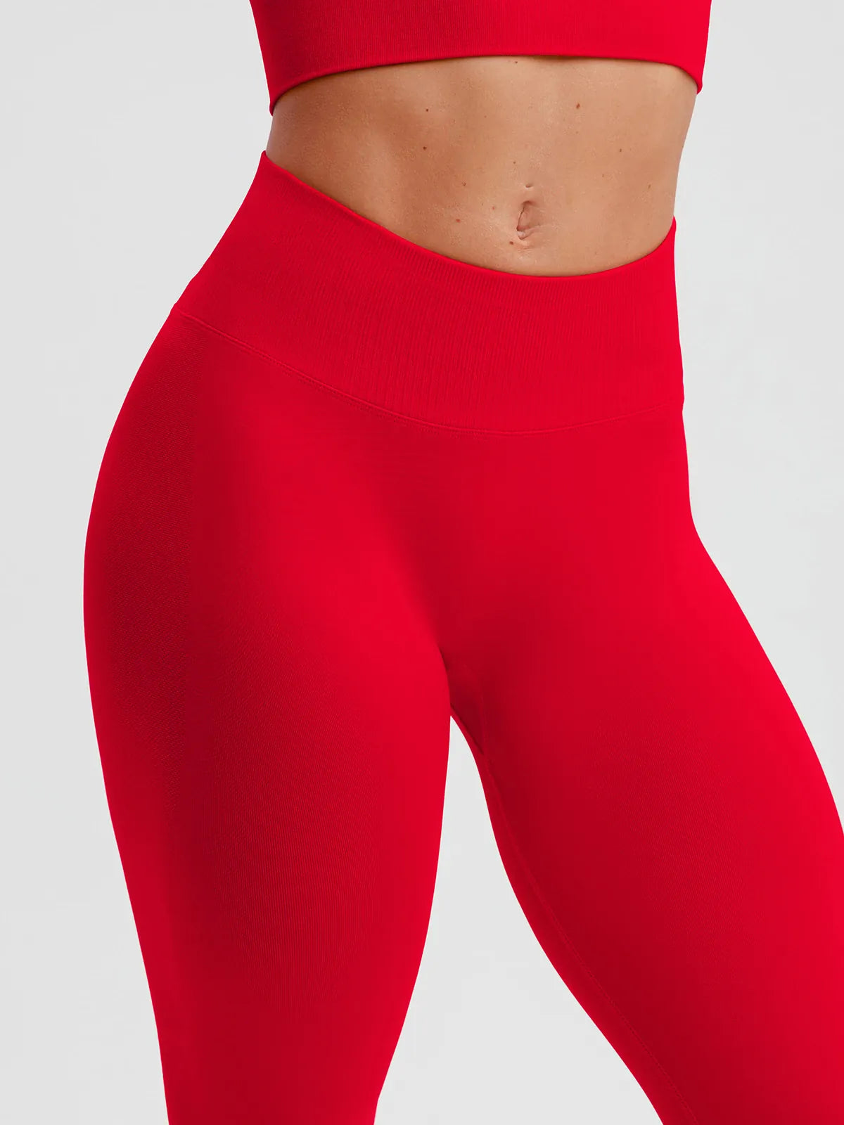 A model wearing a BRXL® STAYLAT™ No-Roll Waistband Seamless Tummy Control Leggings Gen 3