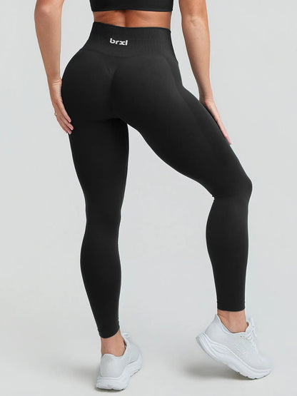 A model wearing a BRXL® STAYLAT™ Seamless High-Rise Sculpt Anti-Roll Leggings 3.0
