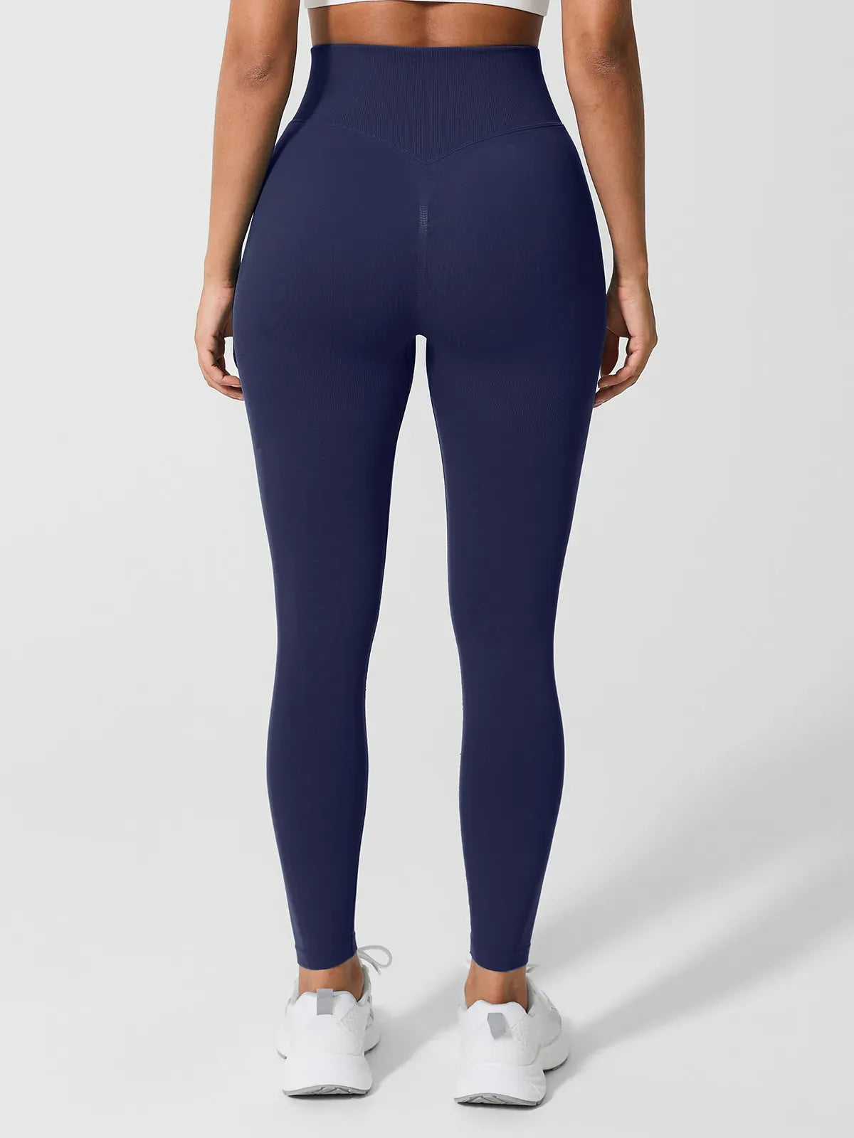 A model wearing a BRXL® B R X L™ Seamless High Waisted Tummy Control Butt-Lifting Leggings