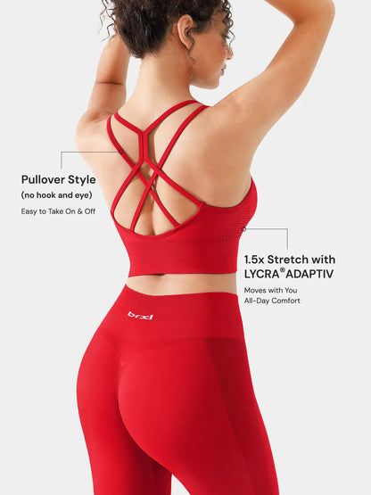 A model wearing a BRXL® B R X L™ Seamless Criss Cross Spaghetti Racerback Sports Bra