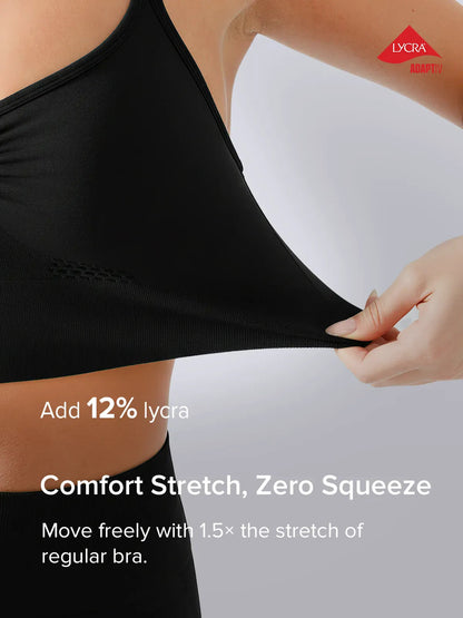 A model wearing a BRXL® B R X L™ Seamless Criss Cross Spaghetti Racerback Sports Bra