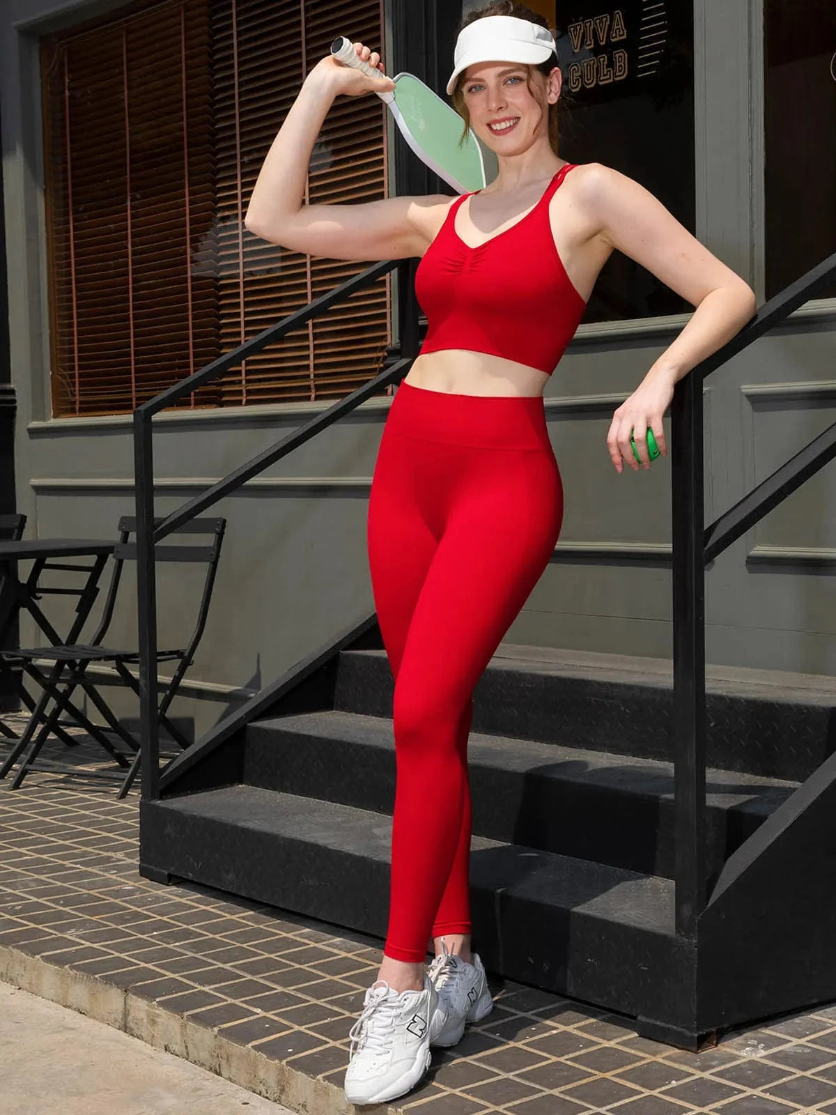 A model wearing a BRXL® Butt Lifting Seamless Bra Scrunch Leggings Set