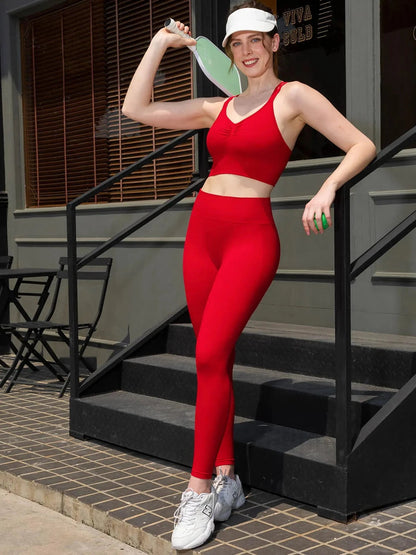 A model wearing a BRXL® Butt Lifting Seamless Bra Scrunch Leggings Set