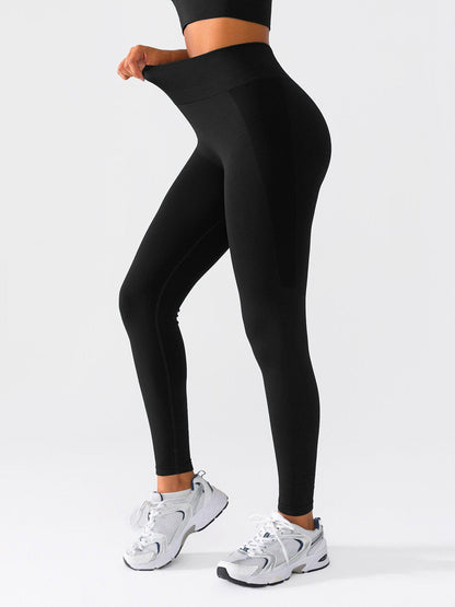 A model wearing a BRXL® Seamless High Waisted Butt-Lifting Leggings in