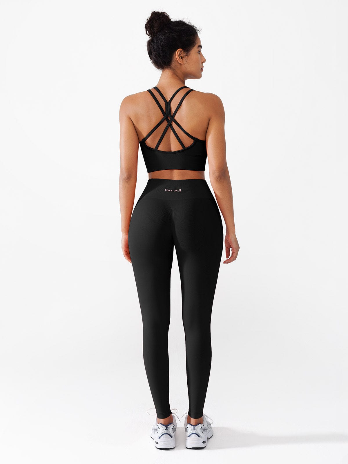 A model wearing a BRXL® Seamless High Waisted Butt-Lifting Leggings