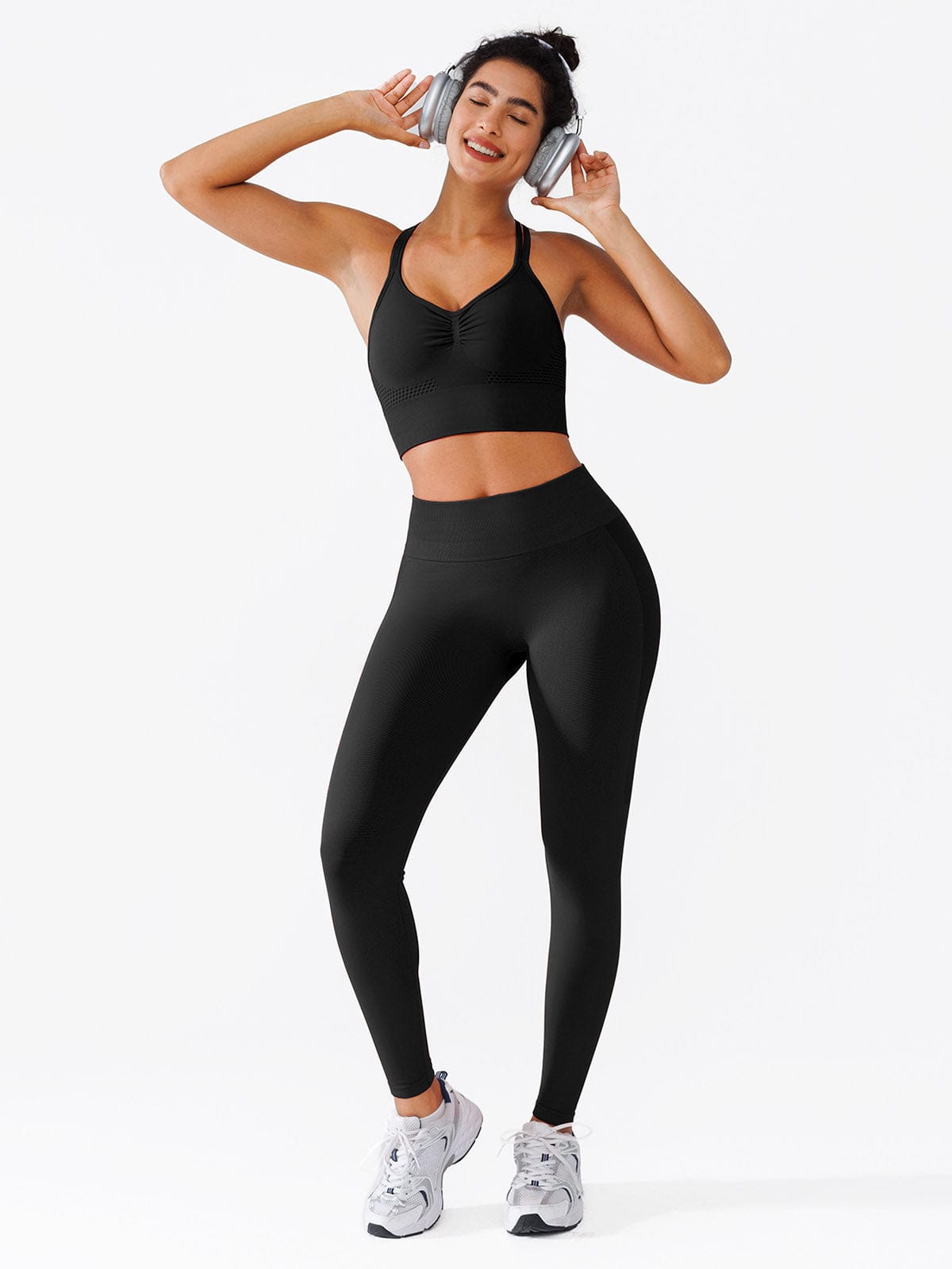 A model wearing a BRXL® Seamless High Waisted Butt-Lifting Leggings