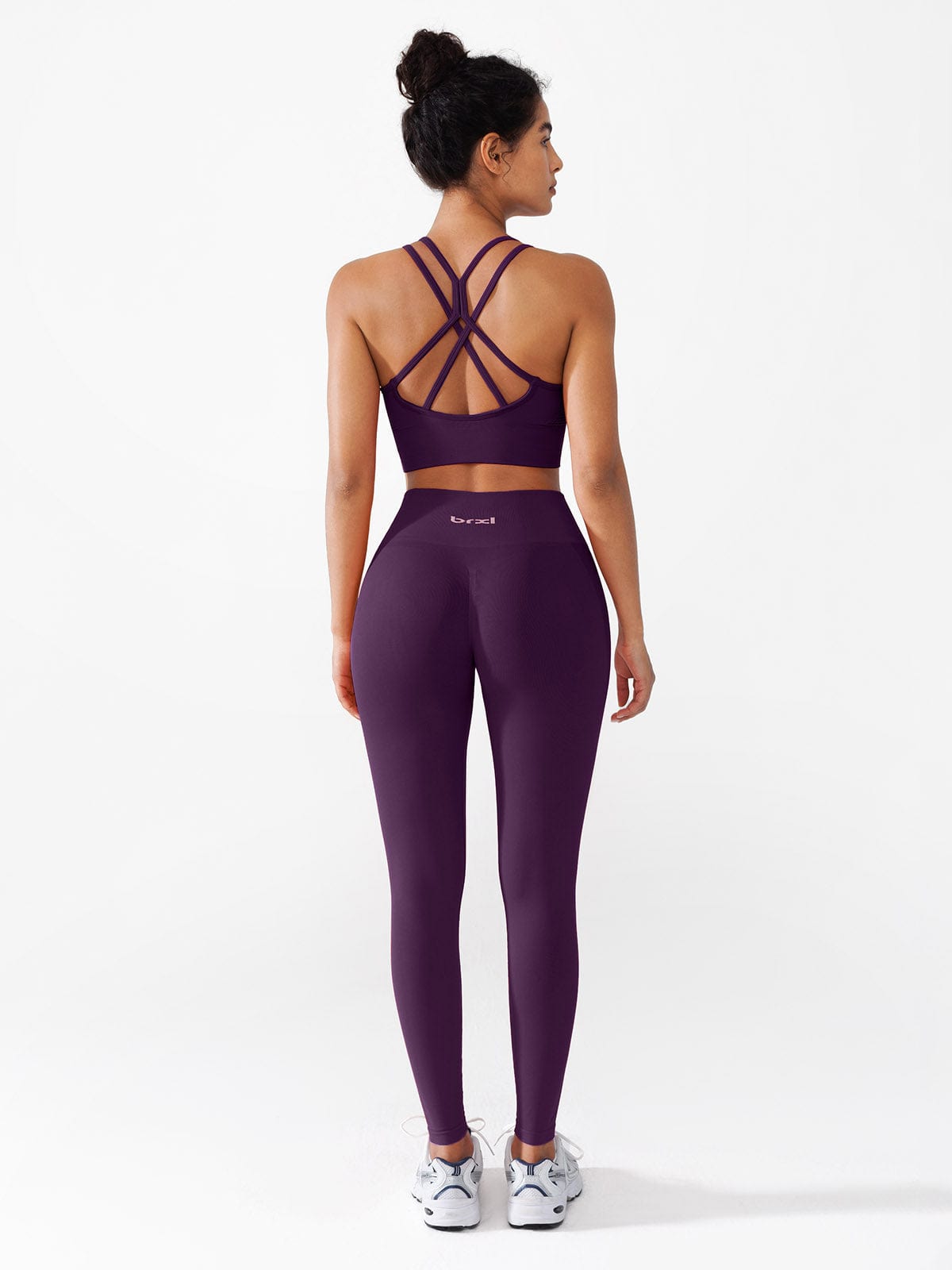 A model wearing a BRXL® Seamless High Waisted Butt-Lifting Leggings