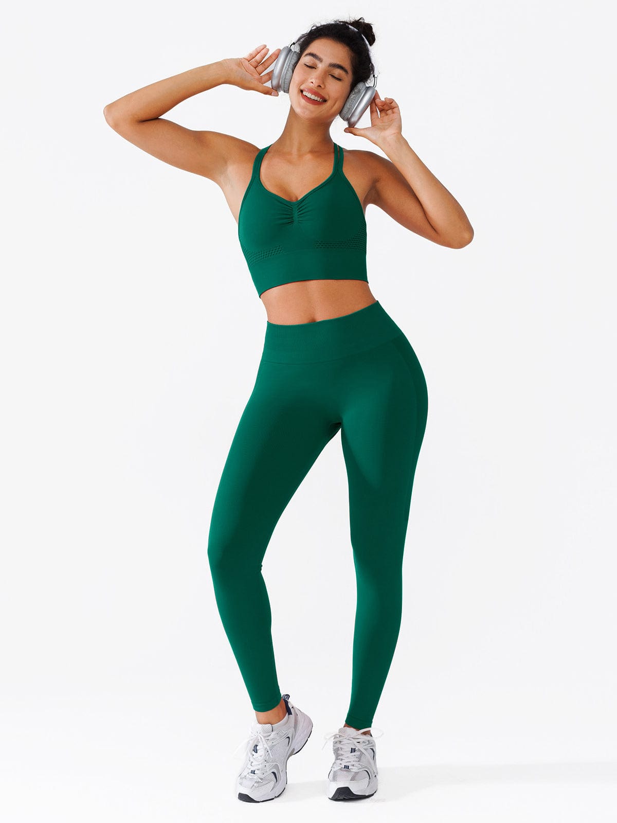 A model wearing a BRXL® Seamless High Waisted Butt-Lifting Leggings in