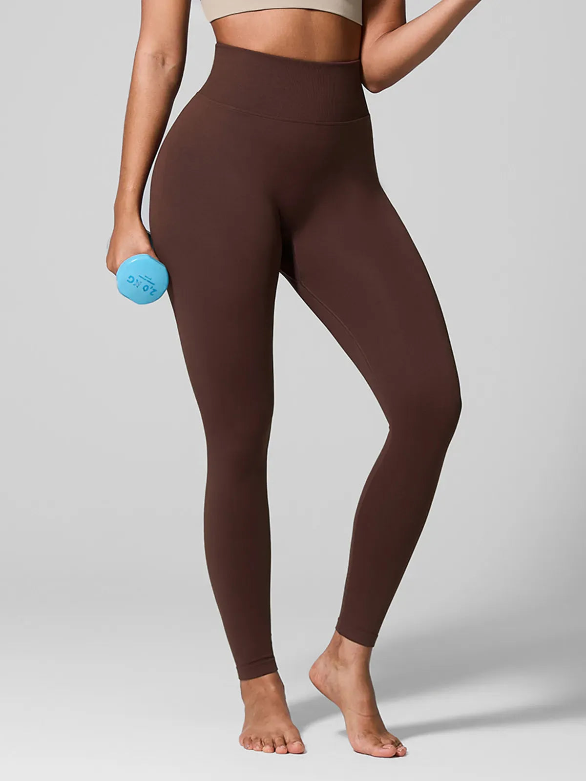 A model wearing a BRXL® Seamless High Waisted Butt-Lifting Leggings in