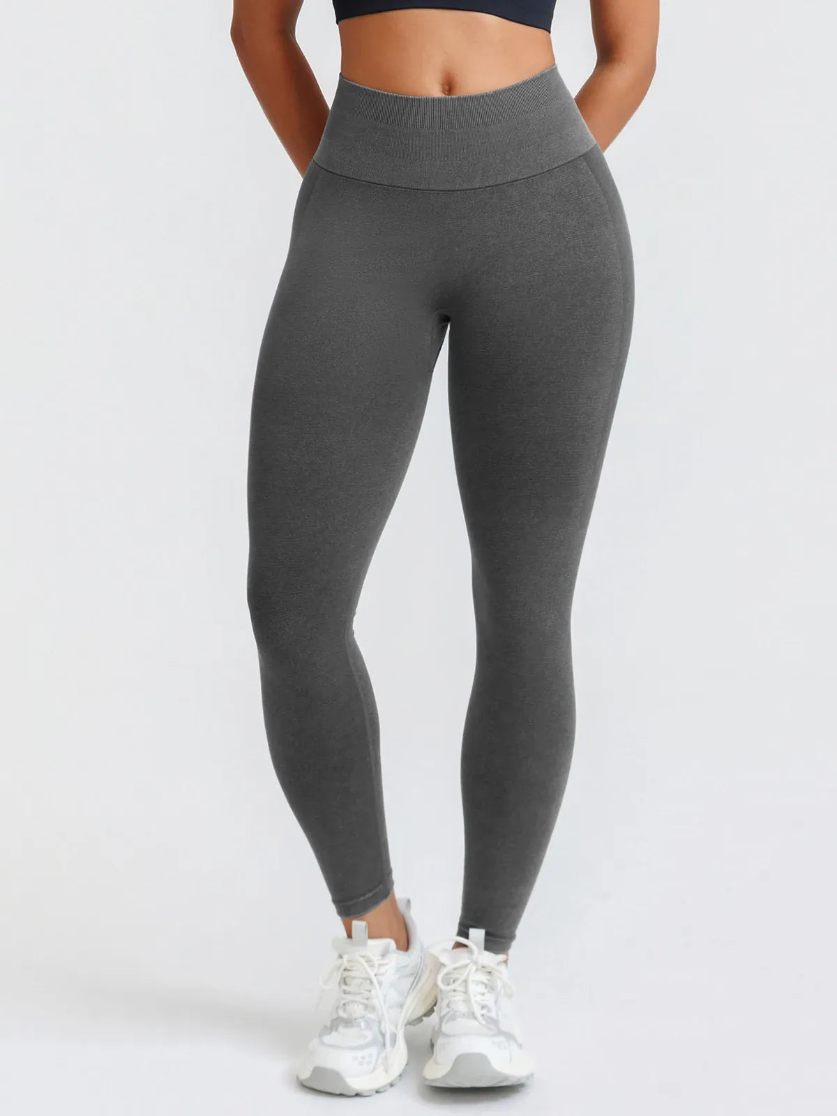 A model wearing a BRXL® B R X L™ Seamless High Waisted Butt-Lifting Leggings