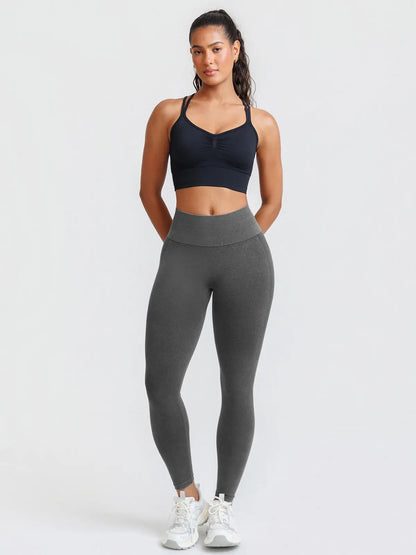 A model wearing a BRXL® B R X L™ Seamless High Waisted Butt-Lifting Leggings